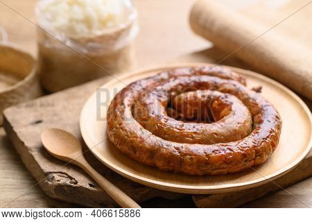 Northern Thai Sausage (sai Aua), Grilled Intestine Stuffed With Minced Pork, Spices And Herbs Eating