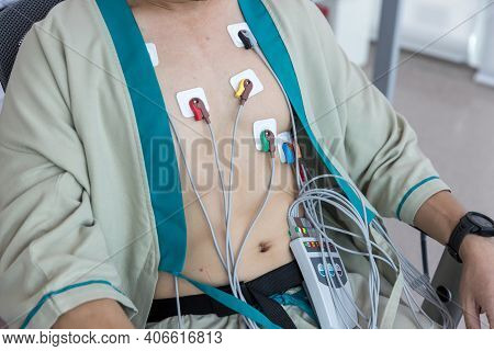 Heart Electrocardiogram Or Monitoring Using Holter For Young Patient. Male Athlete Does A Cardiac St