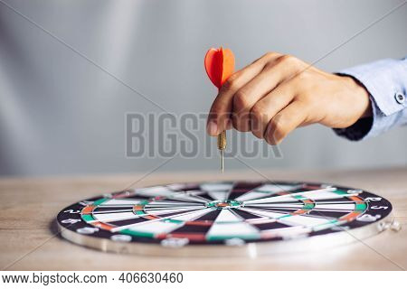 Businessman Holding A Darts Aiming At The Target Center Business Goal Concept - Business Targeting, 