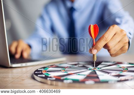 Businessman Holding A Darts Aiming At The Target Center Business Goal Concept - Business Targeting, 