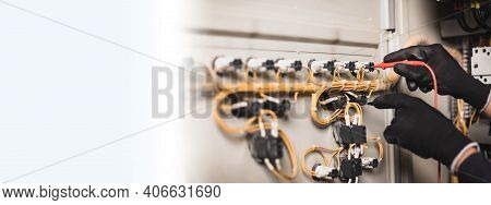 Electrician Engineer Work Tester Measuring Voltage And Current Of Power Electric Line In Electical C