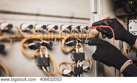 Electrician Engineer Work Tester Measuring Voltage And Current Of Power Electric Line In Electical C
