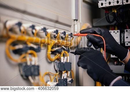 Electrician Engineer Work Tester Measuring Voltage And Current Of Power Electric Line In Electical C