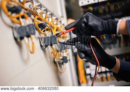 Electrician Engineer Work Tester Measuring Voltage And Current Of Power Electric Line In Electical C