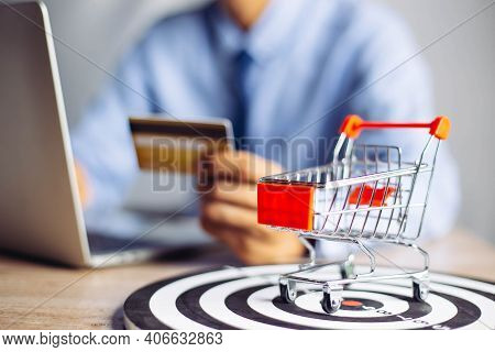 Oline Payment Hands Holding Credit Card And Using Laptop. Online Shopping Concept.