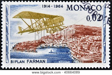 MONACO - CIRCA 1964: stempel trykt i Monaco viser Farman biplan circa 1964