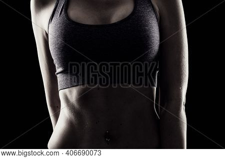 Slim Beauty Athletic Woman On Black Background