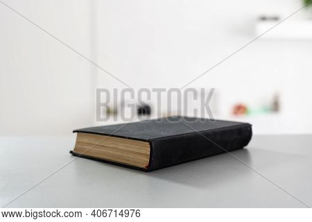 Holy Bible Closeup. Holy Bible On The Small Aged Wooden Table