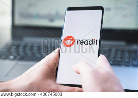 Russia Moscow 02.02.21 Mobile Phone With Logo Of Reddit Traders In Hand. Community Of Financiers Pum