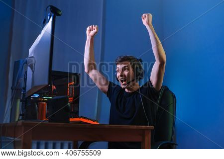Cybersport Gamer Feel Excited While Playing In Online Cyber Sport Play, Won The Game And Cheer With 