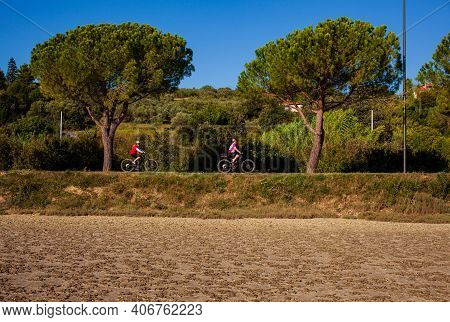 Strunian, Slovenia - September, 19: Mountain Bike Cyclists Riding Countryside Track Next To The Salt