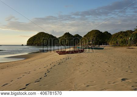 Fishing Boat On The Beautiful Sandy Coast Of The Negros Island In The Philippines In Asia