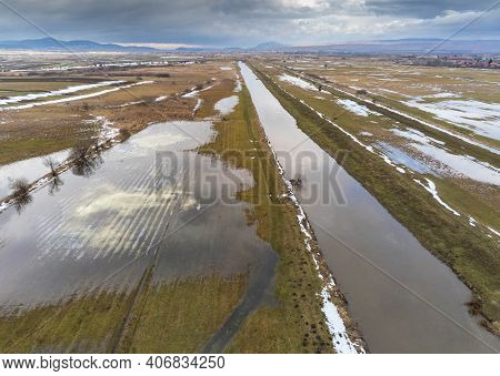 Flooded Areas Near Olt River In Romania, Hungarian Villages In The Background, Aerial View.