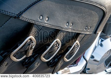 Leather Motorcycle Bag For Carrying Luggage. The Back Of The Motorcycle With A Black Leather Trunk-a