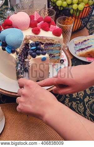 Pregnant Woman Cuts The Cake For Gender Party, Lifestyle. Celebrating The Birth Of A Child And Findi