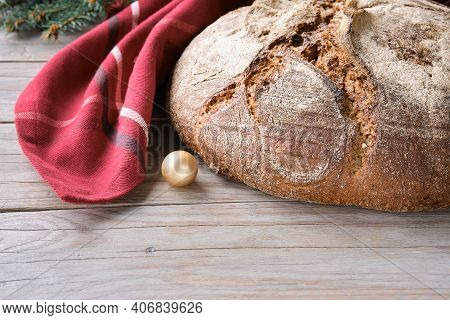 Christmas Bread. Wholemeal Rye Wheat Bread Oven Baked In Ceramic Pan. No Knead Handmade Loaf On Cutt