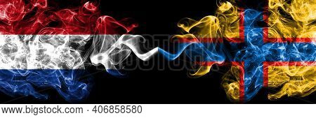 Netherlands Vs Ingrian People Smoky Mystic Flags Placed Side By Side. Thick Colored Silky Abstract S