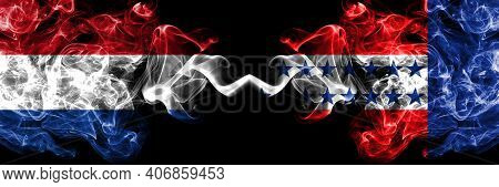 Netherlands Vs Tuamotu Archipelago Smoky Mystic Flags Placed Side By Side. Thick Colored Silky Abstr