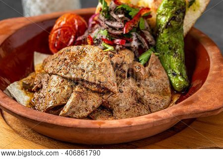 Traditional Turkish Liver Kebab Cuisine. Leaf Liver Spicy. Delicious Turkish Ciger.