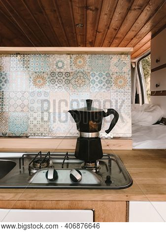 Open Kitchen In A Camping Van - Cooking Coffee In The Open Air - Vanlife