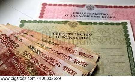 Maikop, Adygea Republic, Russia - February 5, 2021: Five Thousandth Ruble Bills Located On Marital S