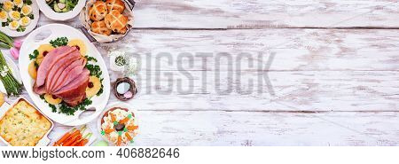 Traditional Easter Ham Dinner. Top Down View Side Border On A White Wood Banner Background With Copy