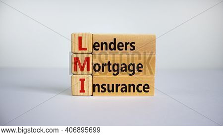 Lmi, Lenders Mortgage Insurance Symbol. Wooden Cubes, The Word 'lmi, Lenders Mortgage Insurance'. Be