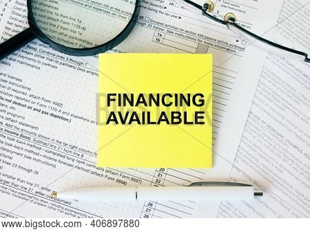 Yellow Sticker With Text Financing Available On Financial Docs