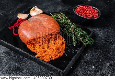 Balearic Sobrassada Cured Meat Sausage From Ground Pork, Paprika And . Black Background. Top View