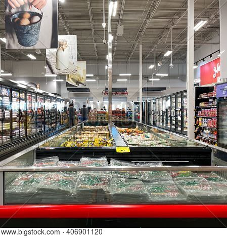 An Overview Of The Refridgerated Section Of A Bravo Market Grocery Store