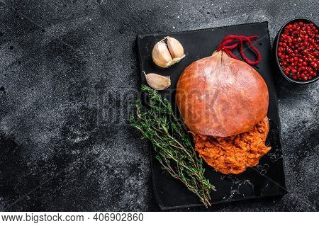 Balearic Sobrassada Cured Meat Sausage From Ground Pork, Paprika And . Black Background. Top View. C