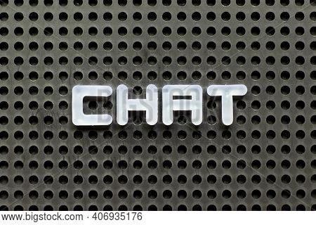 White Color Letter In Word Chat On Black Pegboard Background