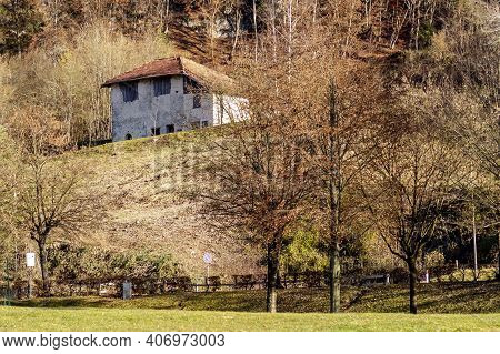 Beautiful View Of An Ancient House On Lake Ledro, Molina Di Ledro In The Province Of Trento, With Th