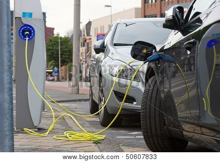 Electric Cars At Charging Station