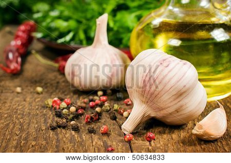 Garlic, Vegetable Oil, Spices And Kitchen Herbs