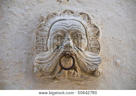 Old horse ring on wall. ischitella. Puglia. Italy.