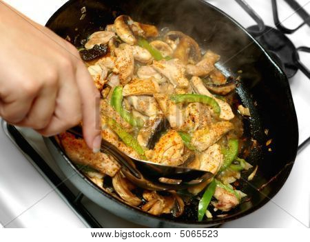 Pollo stirfry cottura