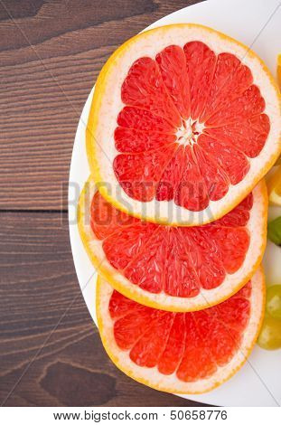 Slice of grapefruit on a palte