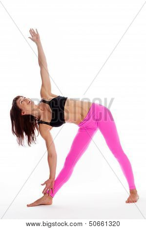 Pretty Woman In Yoga Pose - Triangle Position.