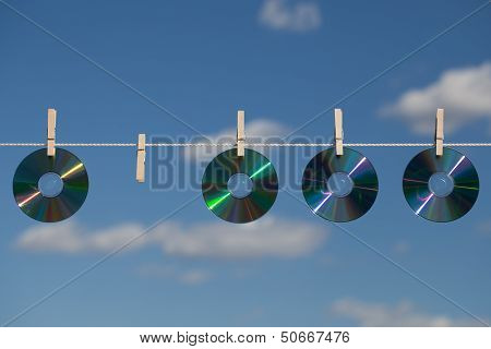 Four Cds On A Clotheslines
