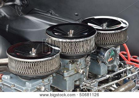 Three carburetor close up