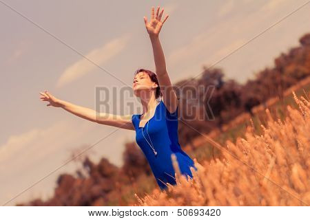 Beautiful Young Woman Loving And Enjoying Sun In Nature