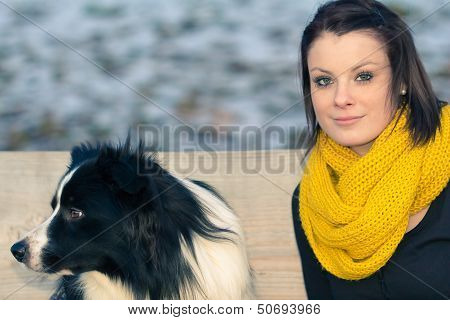 Beautiful Young Woman With Best Dog Friend In Winter