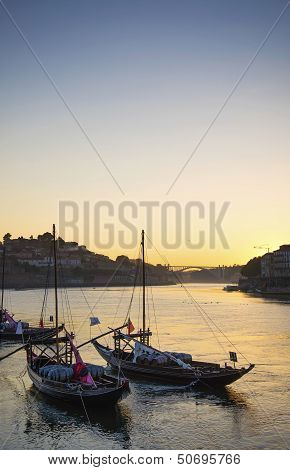 Old Town River Area Of Porto Portugal With Rabelo Boats