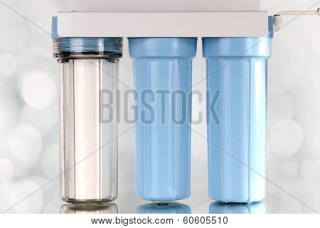 Filter system for water treatment on bright background