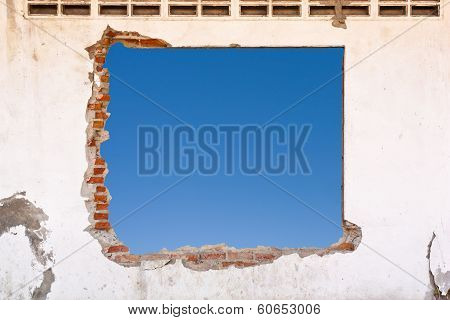 Blue Sky In Aged Brick Wall Background