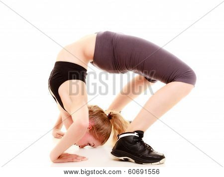 Young Sporty Girl Doing Stretching Exercise Isolated. Healthy Lifestyle