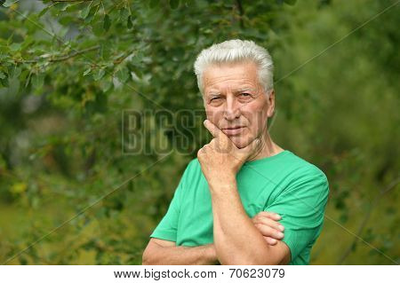 Senior man thinking outddor