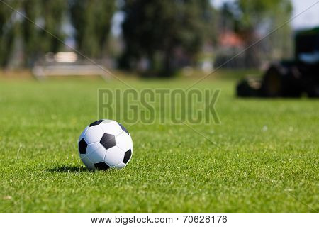 Green Pitch With Soccer Ball