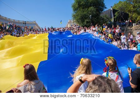 ODESSA, UKRAINE - August 23: Flash mob in city of Odessa on Potemkin Stairs on August 23, 2014, in day of a national flag of Ukraine.